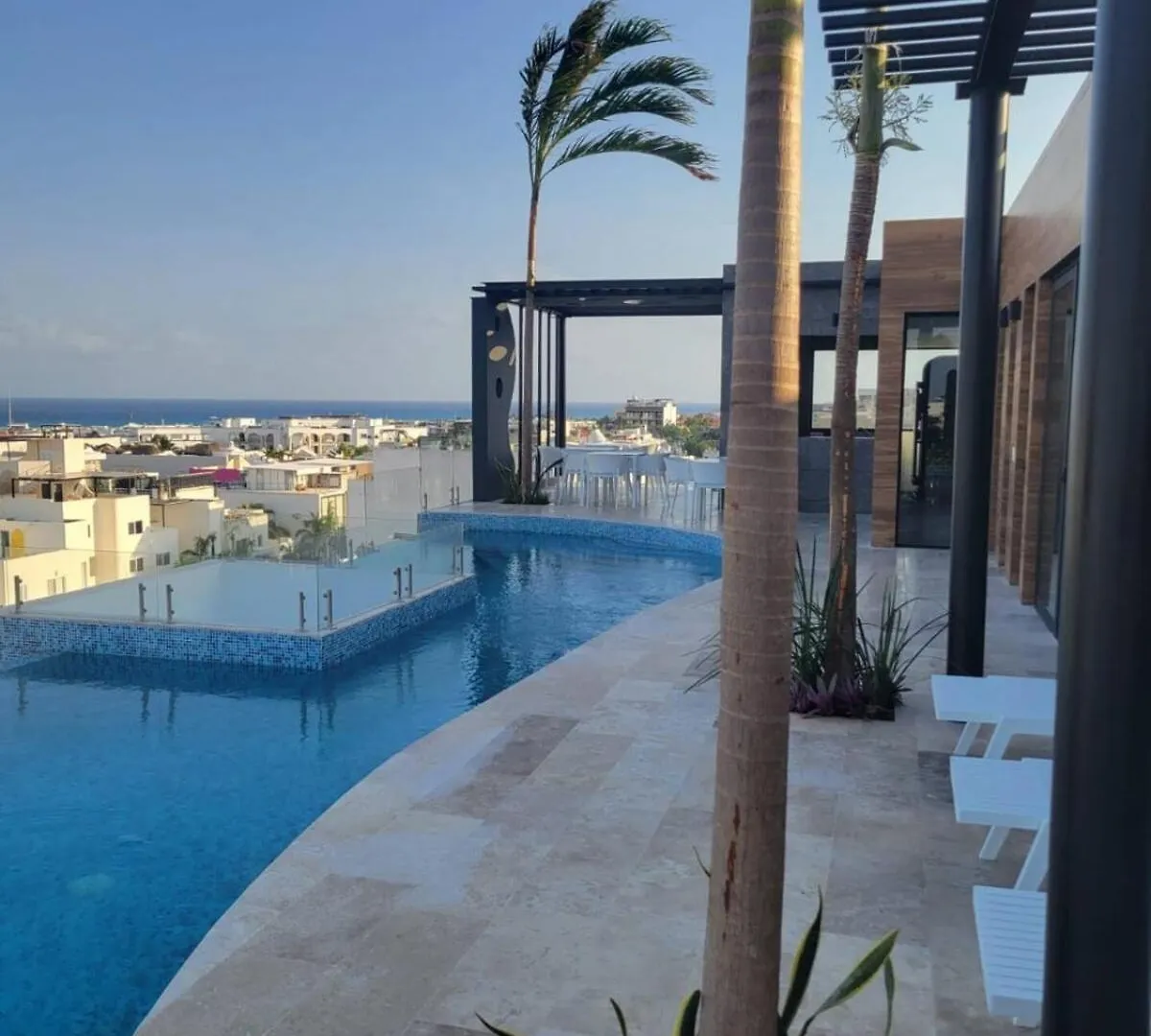 Stylish Condo With Roof Top Ocean Views Near Mamitas Beach And 5Th Ave Playa del Carmen